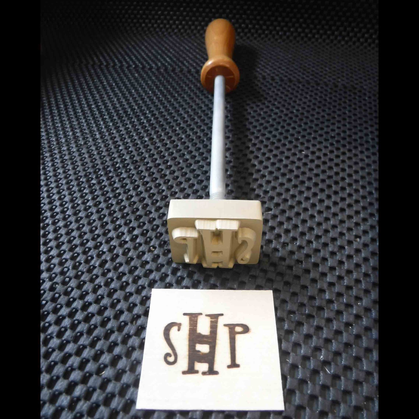 Brass Branding Iron engraved with the logo for Sleep in Heavenly Peace - SHP